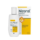 Nizoral shampoo bottle and packaging on a white background | health boutique